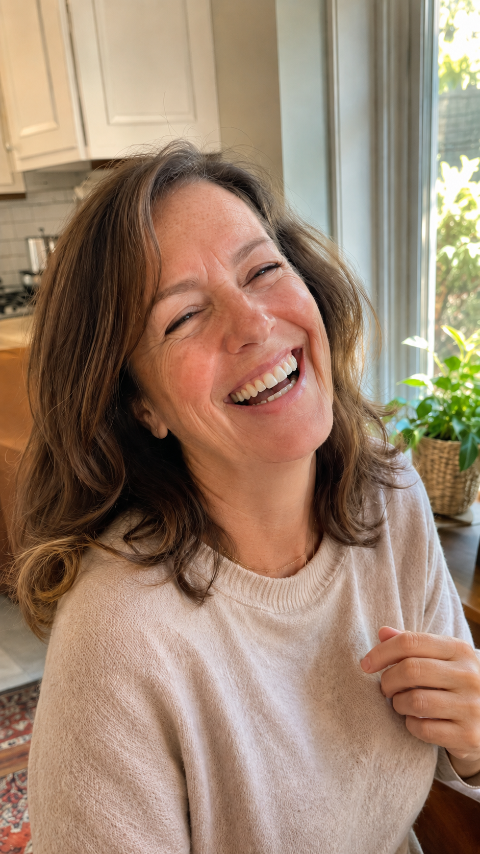 A woman smiling comfortably and at ease